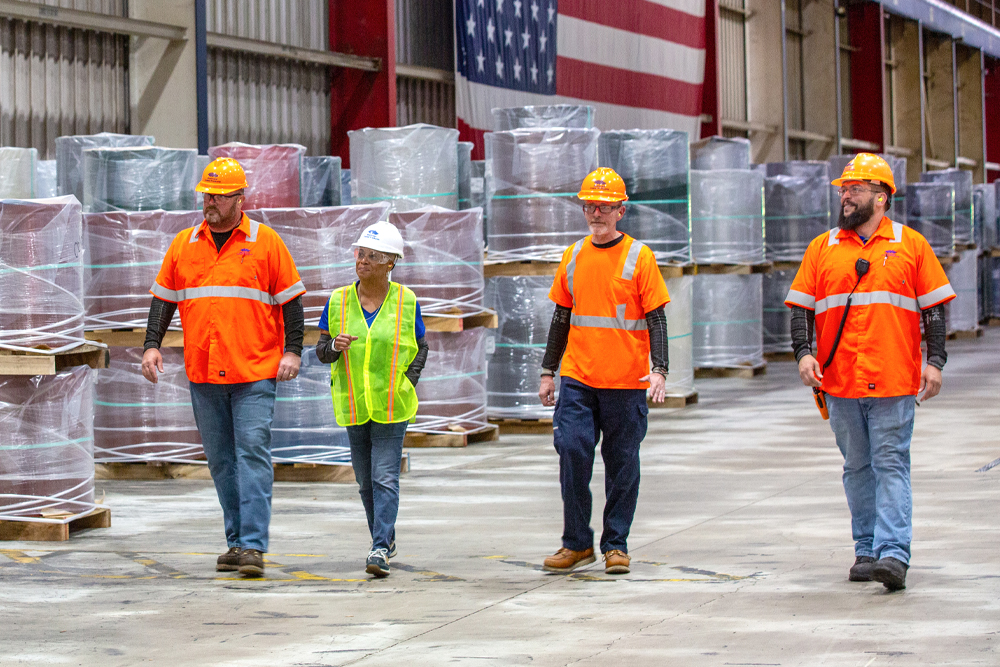 BlueScope employees walking through facility